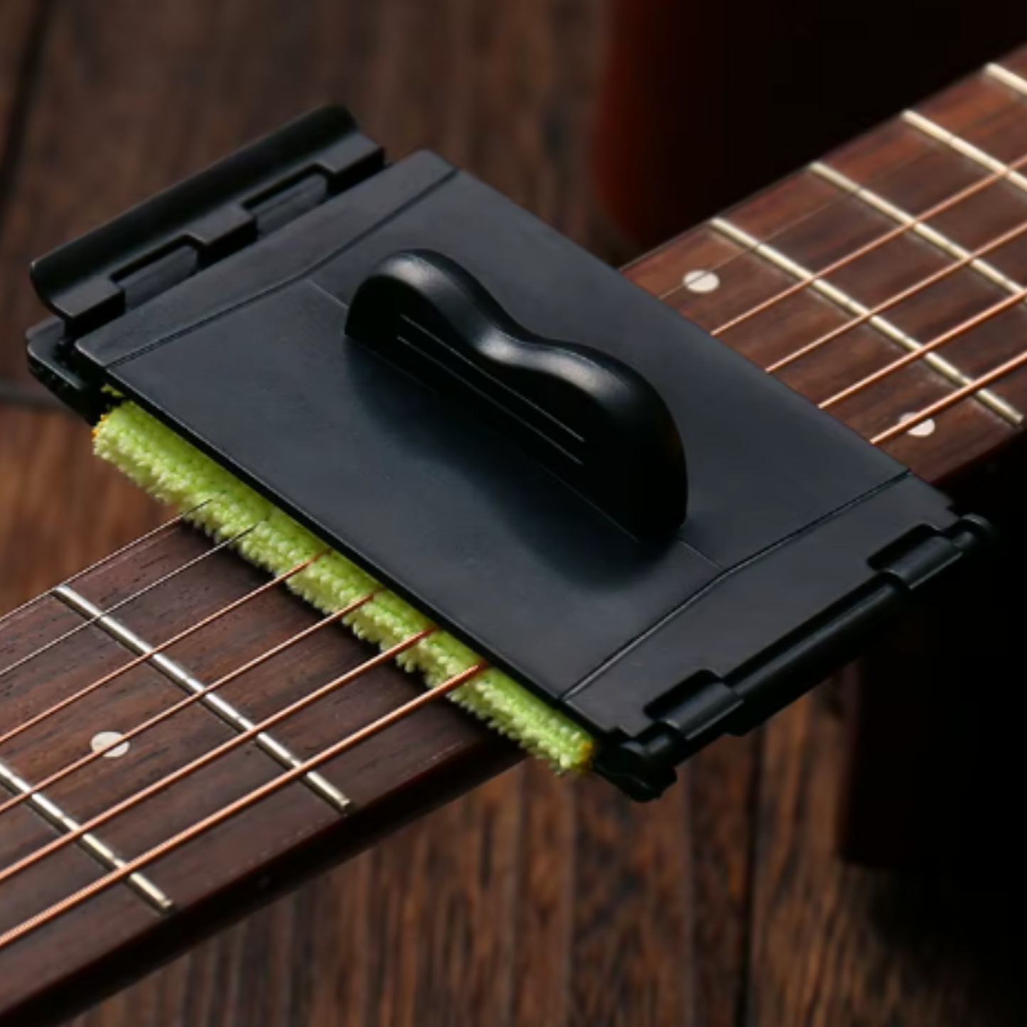 Guitar string care device